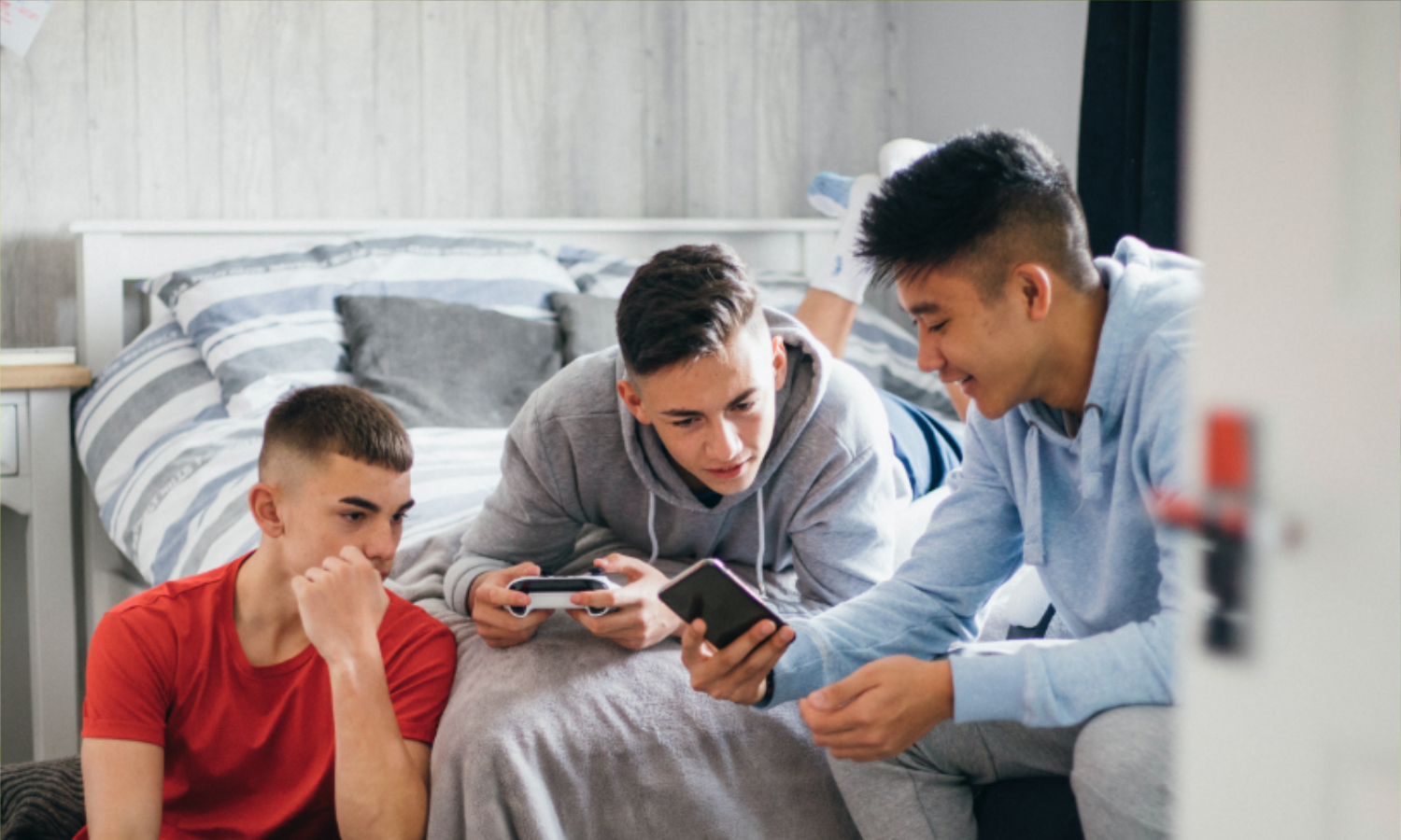 Young people playing on phones
