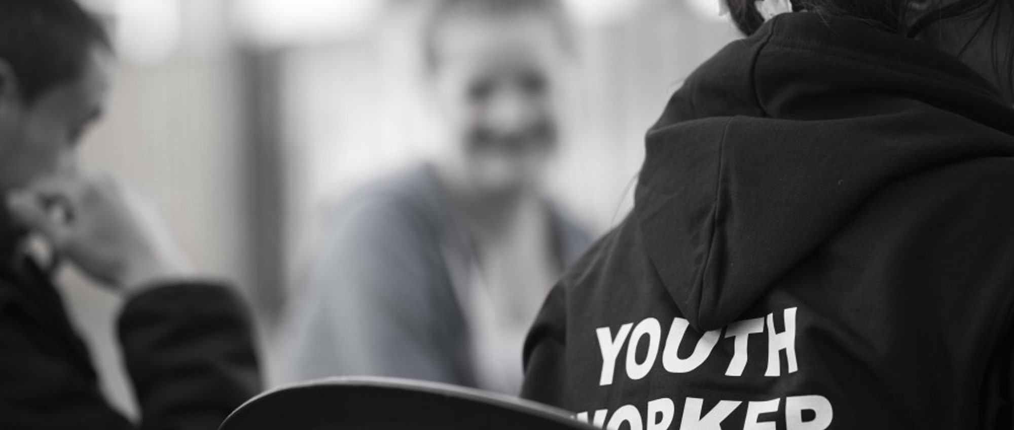 A picture of a youth worker working with young people