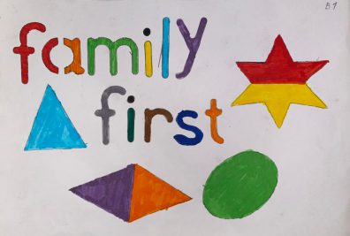Photo of the words family first with stars and shapes