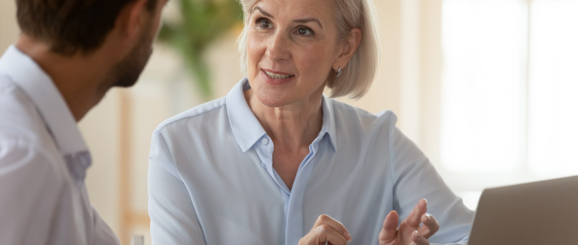 Photo of a man and woman talking