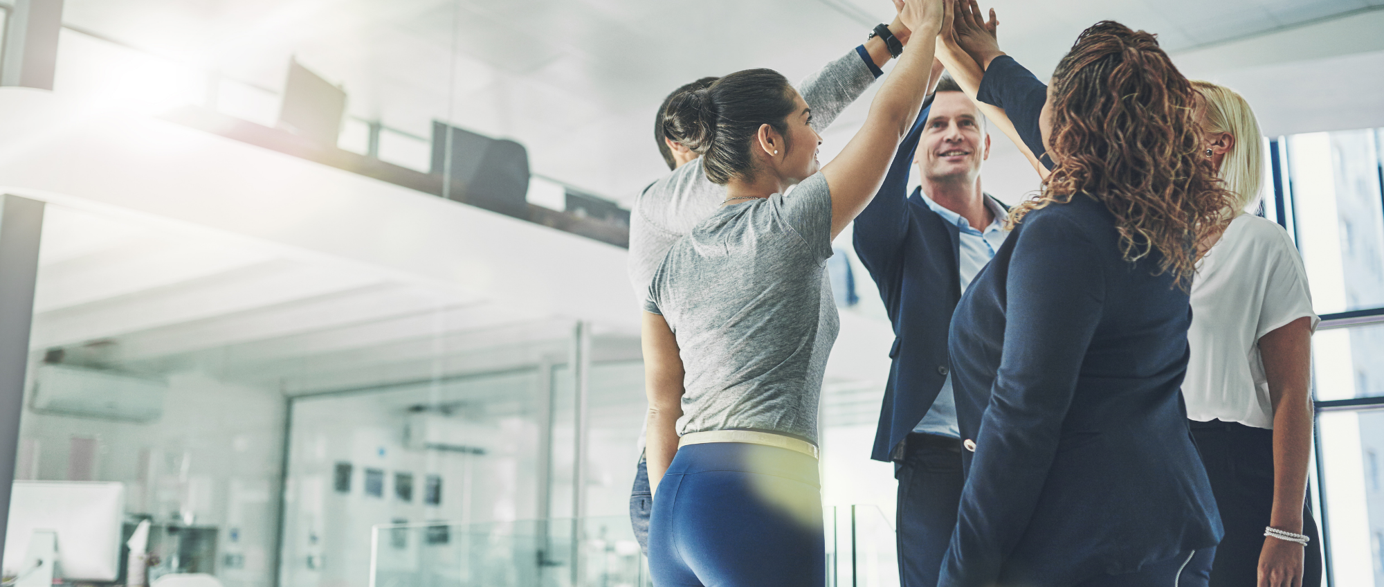 Photo of people highfiving