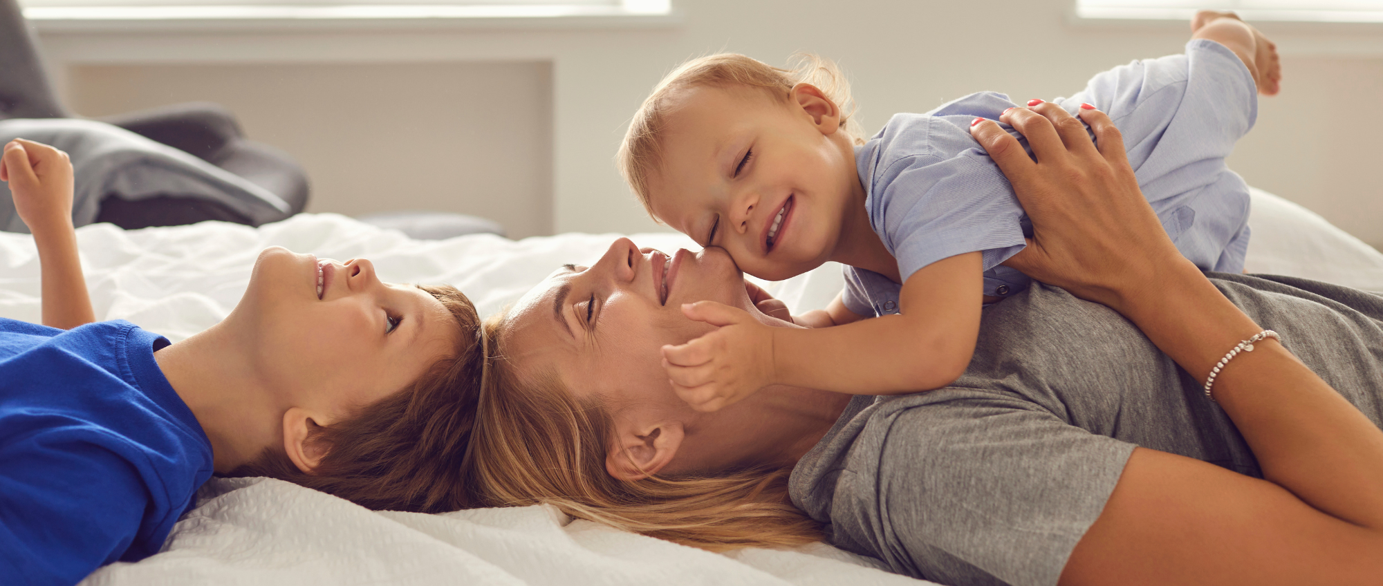 Photo of a mum and two children