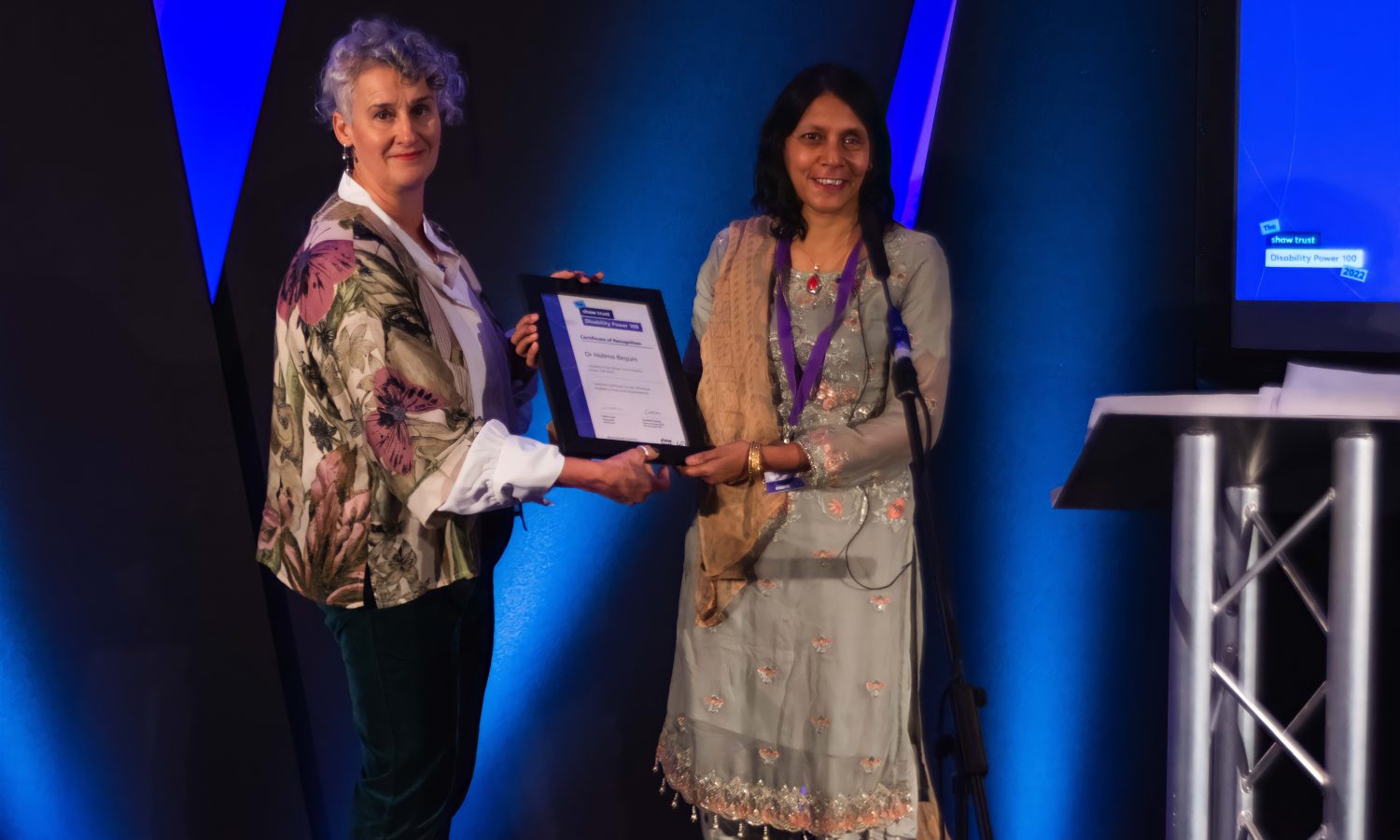 Dr Halima Begum being presented with certificate at Disability Power 100 2022