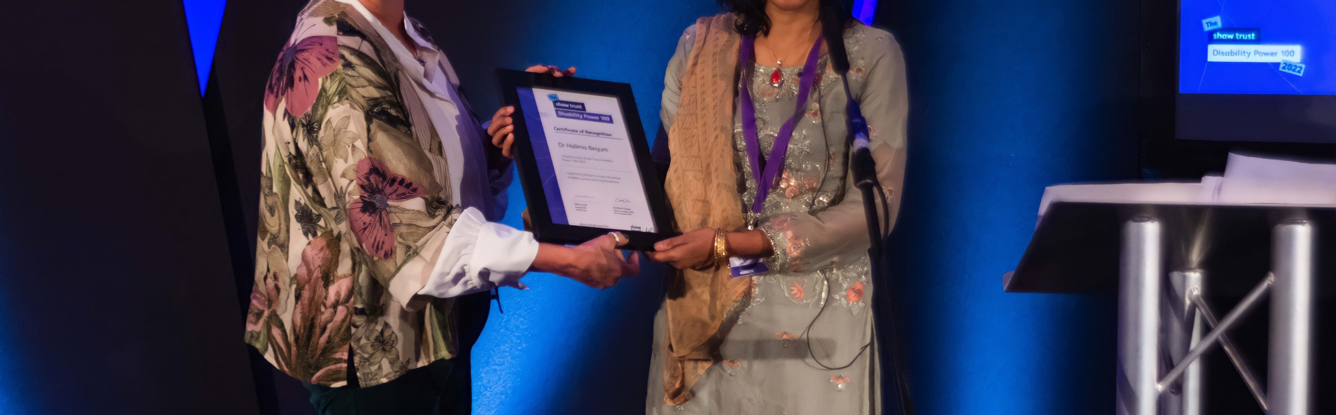 Dr Halima Begum being presented with certificate at Disability Power 100 2022